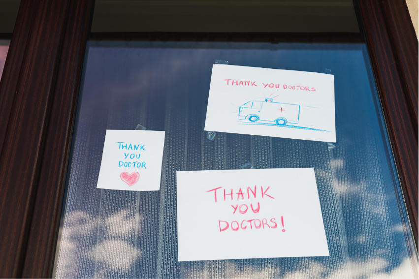 3 notes conveying thanks to a clinical care team stuck on a window